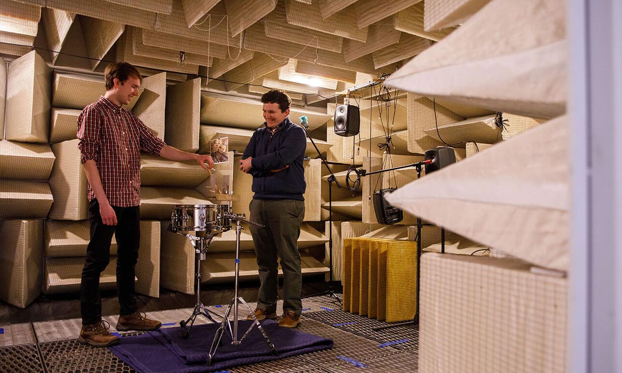professor and student in sound room